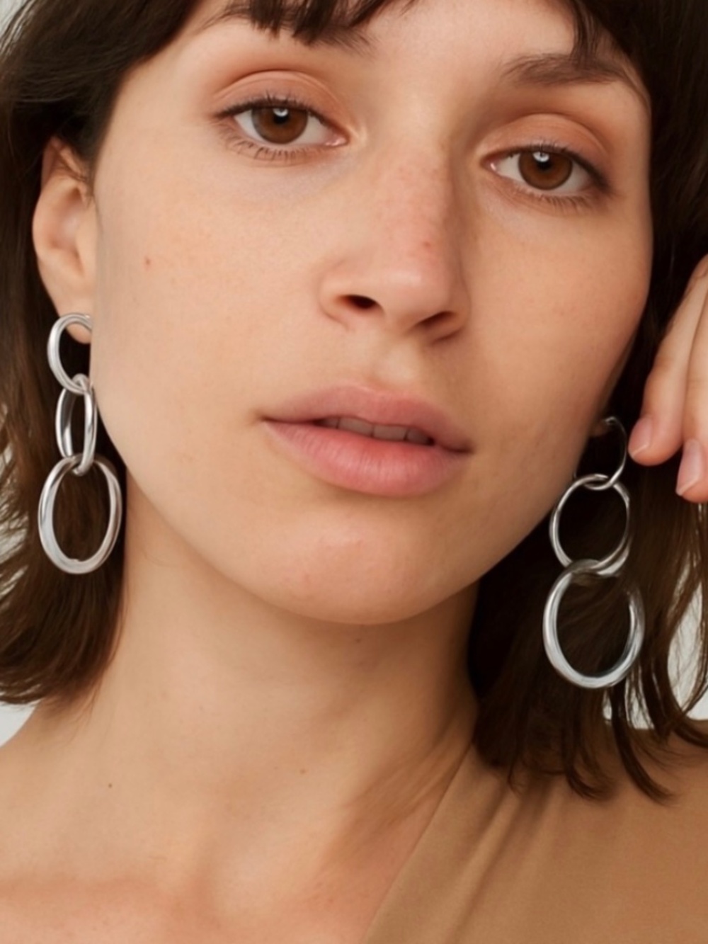 NWT Jenny Bird Ossie Earrings Silver Statement Hoops Sculptural Drop